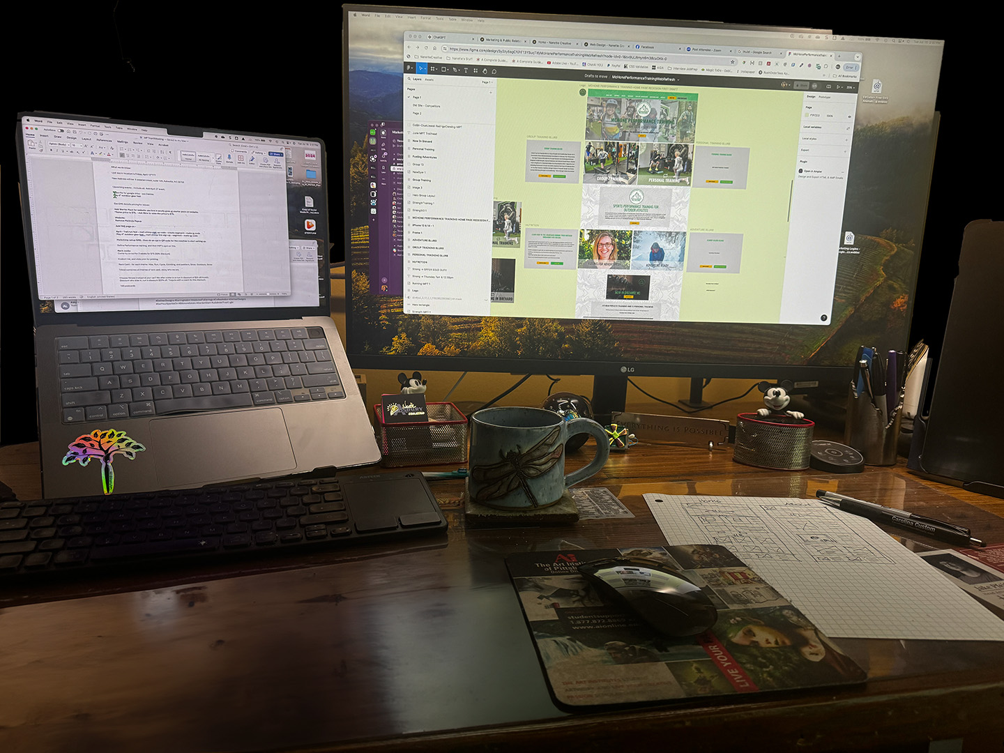 Picture of desk with web design in progress on the screen for nanette creative.