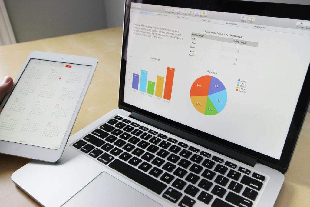 Picture of a compture showing marketing analytics, photo credit Photo by Pixabay: https://www.pexels.com/photo/gray-and-black-laptop-computer-265087/